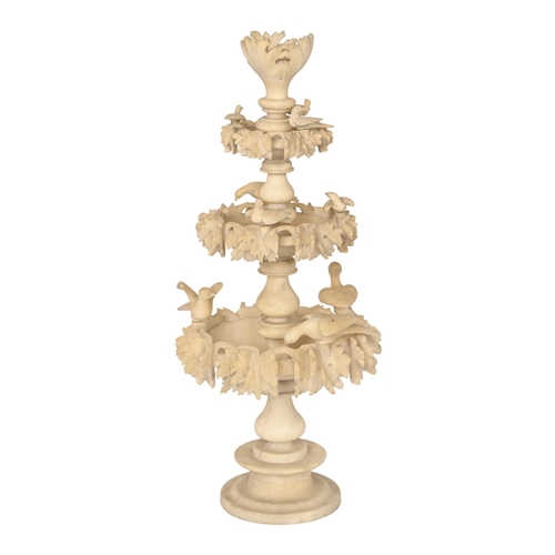 824 - A Victorian carved alabaster centrepiece, on turned pillar, 62cm h