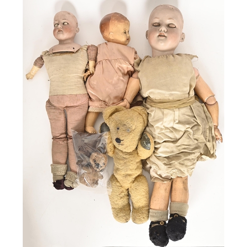 827 - An Armand Marseille bisque headed doll, early 20th c, with articulated composite limbs, 58cm l, a co... 