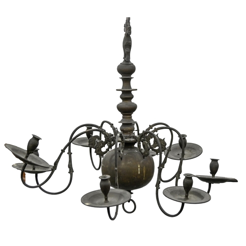 857 - A brass chandelier, early 20th c, in 17th c German style, of seven lights on scrolling branches, iss... 