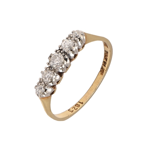 9 - A diamond ring, in gold, marked 18ct, 2.3g, size L