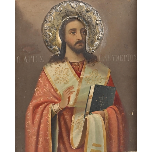 979 - Greek Icon. Saint Eleftherios, early 20th c, oil on board with silver coloured metal halo, 26.5 x 22... 