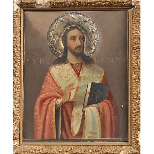 979 - Greek Icon. Saint Eleftherios, early 20th c, oil on board with silver coloured metal halo, 26.5 x 22... 