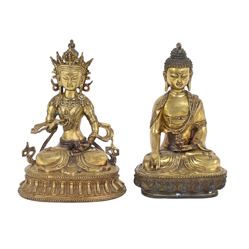 618 - A pair of South East Asian gilt lacquered brass sculptures of Buddha, sealed, 29cm h... 