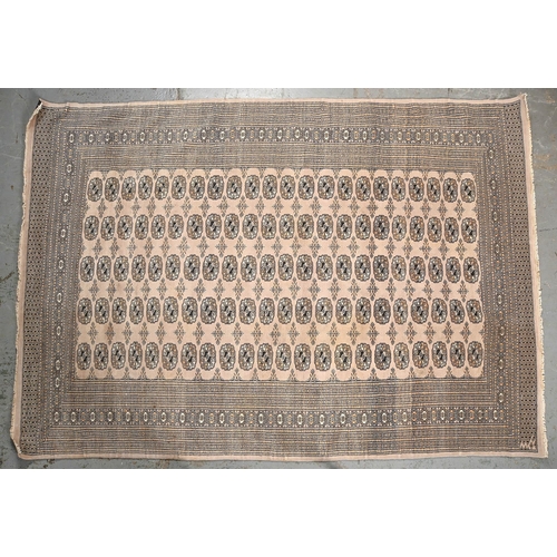 1063 - An Indian bokhara design carpet, 270 x 188cm