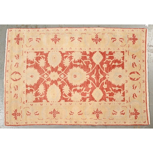 1069 - An Afghan chobi ziegler pattern rug, 180 x 125cm