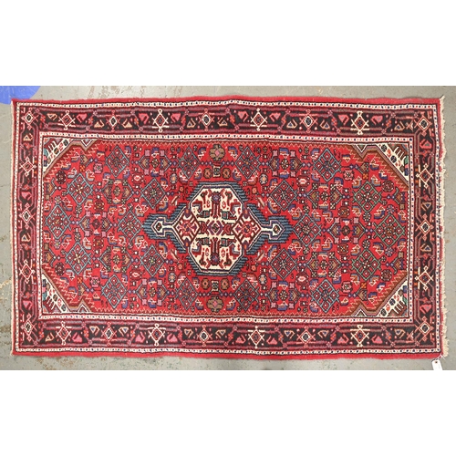 1089 - A Middle Eastern rug, 186 x 108cm