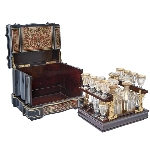 1098 - A French ebonised and Boulle decanter case, late 19th c, inlaid with cut brass scrollwork on a groun... 