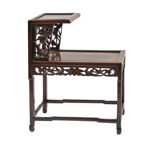 1105 - A Chinese hardwood two tier table, early 20th c, carved with birds, berries and bamboo, 76.5cm h; 31... 