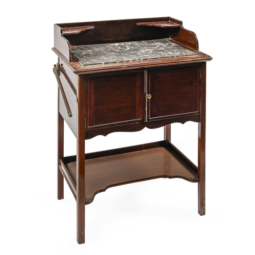 1125 - An Edwardian mahogany wash stand, with marble inset top and brass towel rail, 86cm h; 46 x 65cm... 