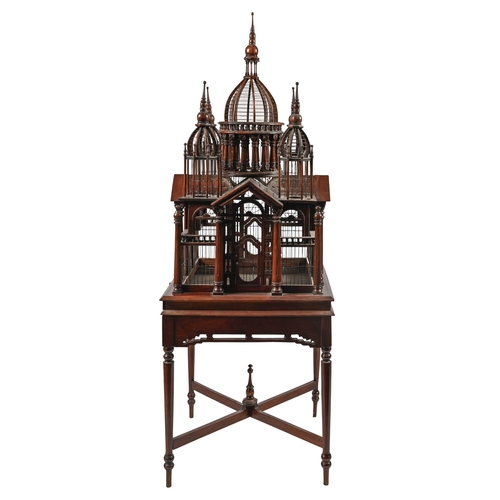 1127 - A South East Asian hardwood birdcage in the form of a palace, on stand with turned legs and stretche... 