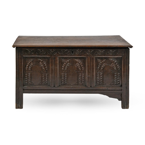 1128 - A Victorian carved and panelled oak blanket chest, with boarded lid, 67cm h; 120 x 52cm... 