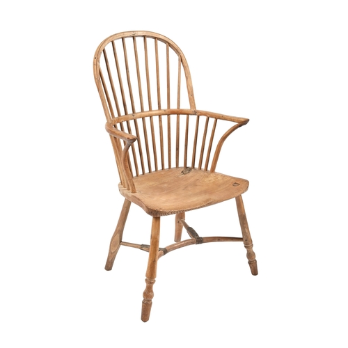 1137 - A Victorian yew wood Windsor chair, with ash seat and crinoline stretcher base, seat height 41cm... 