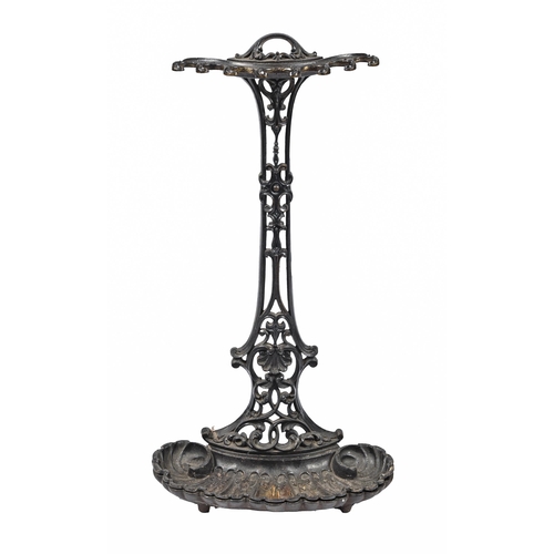 1144 - A Victorian cast iron umbrella stand, c1880, on shell shaped base with detachable tray, 85cm h, indi... 