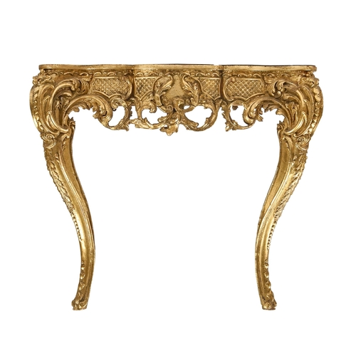 1170 - A giltwood console table, 19th c, the apron to the serpentine top with blind trellis and open scroll... 