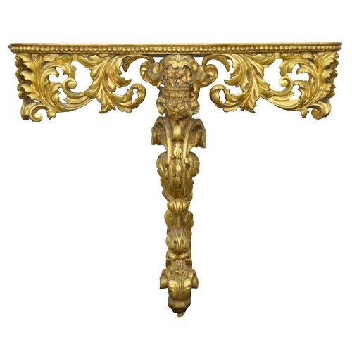 1170A - A giltwood console table, 19th c, the beaded serpentine top above a deep apron of scrolling acanthus... 