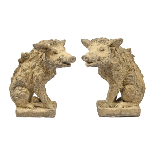 1179 - A pair of reconstituted stone wild boar garden ornaments, 55cm h