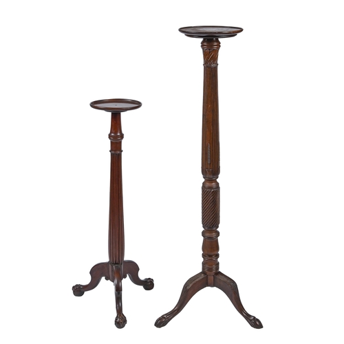 1180 - A Victorian mahogany torchere, turned and carved pillar on claw and ball feet, 149cm h and a similar... 