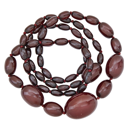 123 - A necklace of faturan beads, 58g