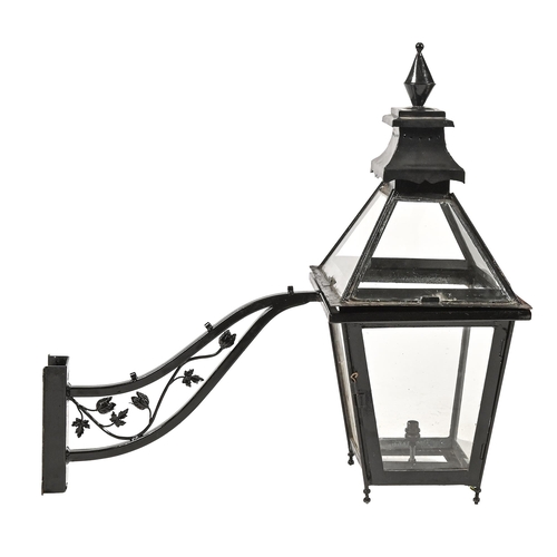 1238 - A painted metal street lantern, probably early 20th c, 92cm h, restored and a wrought iron lantern b... 