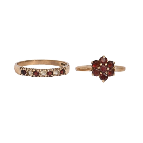 128 - Two garnet and other gem set gold rings, in 9ct gold, London 1972, marks obscured, 3.6g, size N and ... 