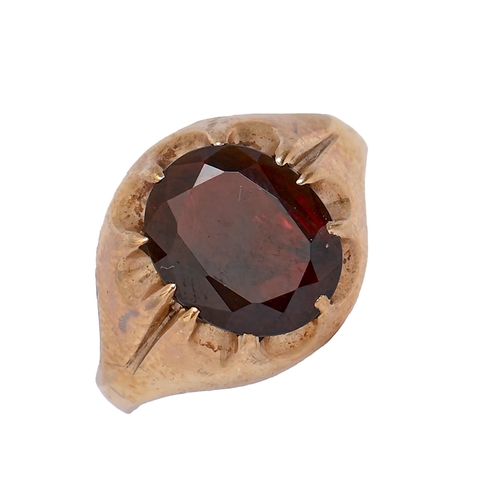 129 - A garnet signet ring, in 9ct gold, marks rubbed, 4.8g, size S