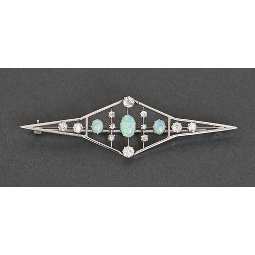 135 - An art deco opal and diamond brooch, c1940, in white gold, 79mm l, marked 18ct, 10.3g... 