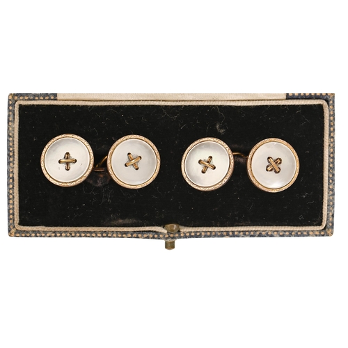 136 - A pair of interchangeable gold and mother-of-pearl cufflinks/buttons, 14mm diam, marked 9ct, 7g... 