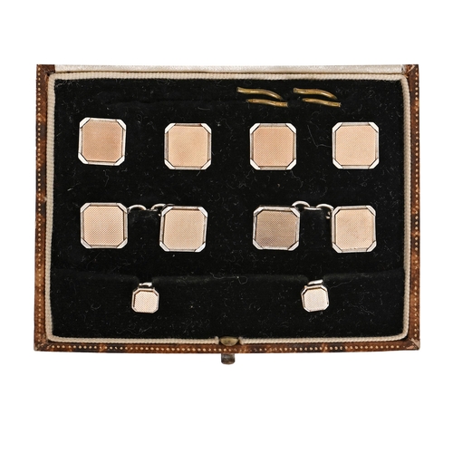 137 - A two colour gold dress set, engine turned, cufflinks 11 x 11mm, marked 9ct, 22.5g