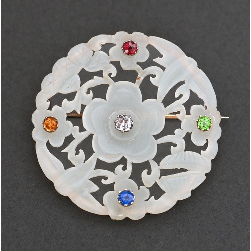 144 - A Chinese mutton fat jade, diamond and other gem set brooch, mounted on white gold, 43mm diam, 10.5g... 