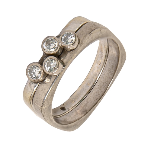 18 - A diamond square ring and a companion ring, in platinum, indistinctly marked, 7.5g, size LProvenance... 