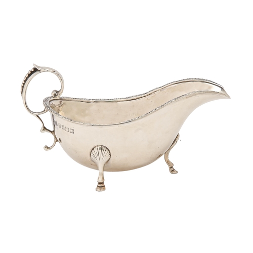 193 - An Irish silver sauceboat, on three hoof feet, 15cm l, by William Egan & Sons, Dublin 1966, 4oz ... 