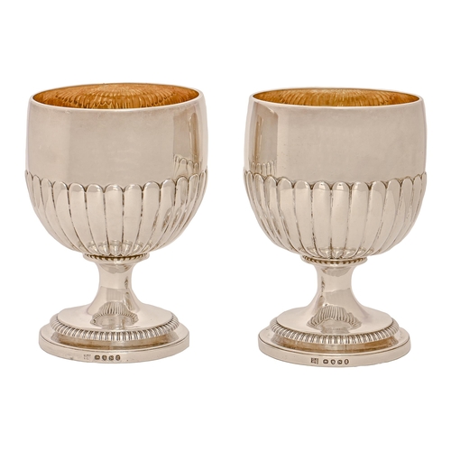 257 - A pair of George III silver goblets, with lobed cup shaped bowl, 14.5cm h, by William Burwash and Ri... 