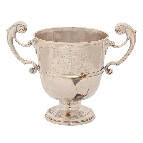 277 - An Irish George II silver cup, with reeded girdle and engraved with contemporary achievement of arms... 