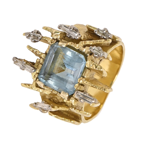 36 - An aquamarine and diamond ring, of abstract form, in gold with textured band, 14.5g, size I... 