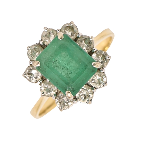 37 - An emerald and diamond ring, the step cut emerald 7 x 9mm, in evenly sized diamond surround, in whit... 