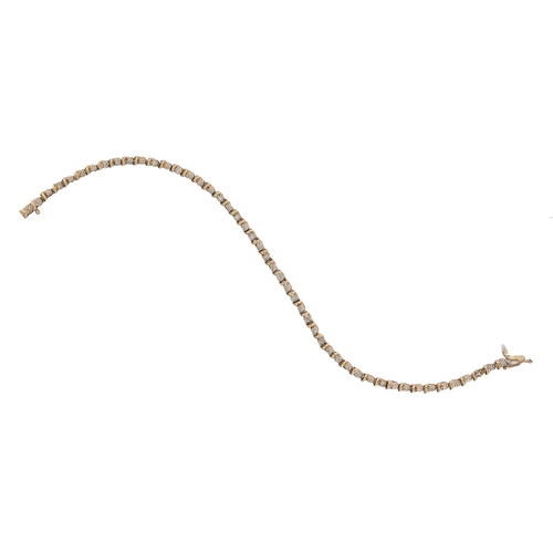 5 - A diamond bracelet, in gold, 19.5cm l, marked 9kt, 5.4g