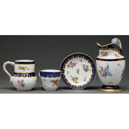 519 - A Chelsea-Derby style baluster mug, 19th c, painted in polychrome with flowers, cobalt blue and gilt... 