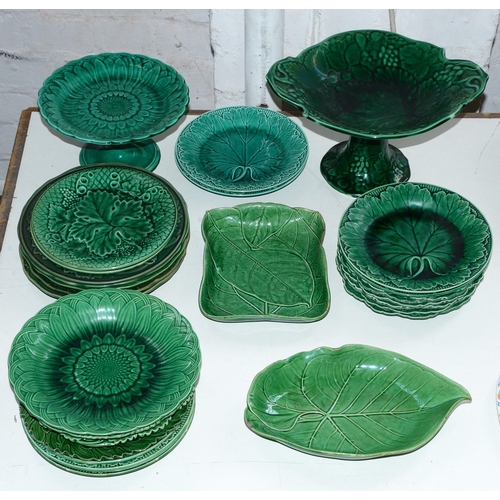 541 - A collection of Wedgwood, Copeland and other British green glazed leaf moulded dessert plates and fr... 