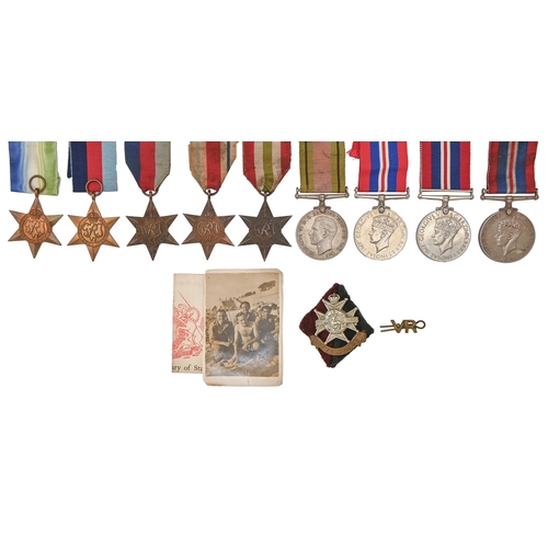 569 - WWII Stars, five, including Atlantic Star, four other WWII medals and Notts & Derby Regt cap bad... 