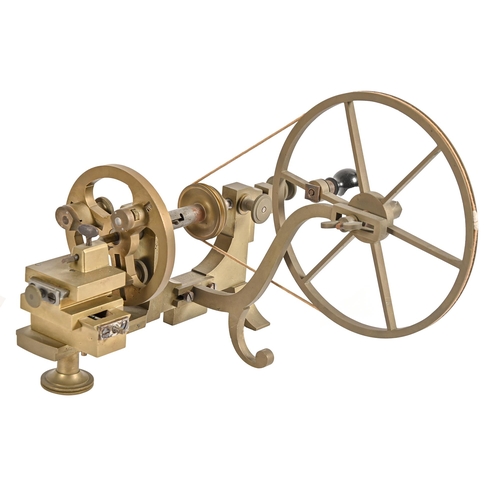 590 - A brass and ferrous metal watchmaker's lathe, 20th c, 30cm l