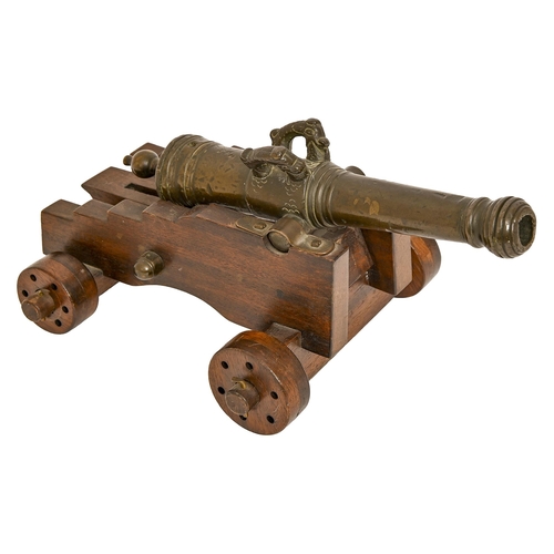 591 - A Dutch-style miniature bronze cannon, 19th c, of 15mm bore, the three stage barrel with bellied muz... 