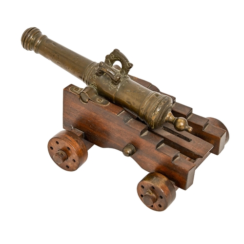 591 - A Dutch-style miniature bronze cannon, 19th c, of 15mm bore, the three stage barrel with bellied muz... 