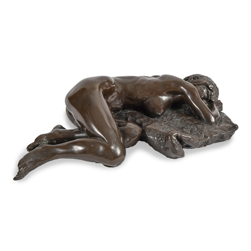 603 - A bronze resin sculpture of Jacci Lying, cast from the model by Tom Greenshields, 40cm l... 