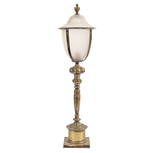 626 - An EPNS electric newel lamp, c1920, of shield shape enclosed by opal glass, on lobed and waisted pil... 