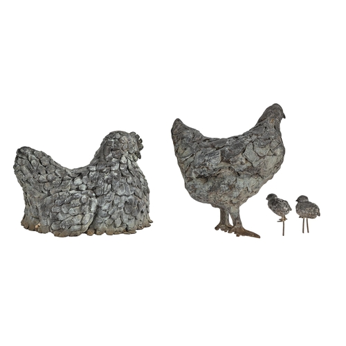 633 - Garden ornaments. A group of four bronze sculptures of a family of hens and chickens, early 21st c, ... 