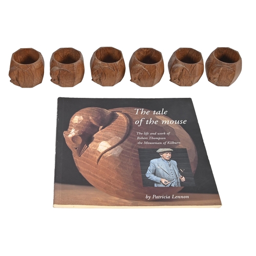 658 - A set of six Robert 'Mouseman' Thompson oak napkin rings, c1980, of octagonal shaped, carved mouse '... 