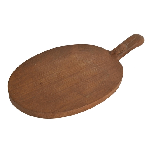 659 - A Robert 'Mouseman' Thompson oak cheeseboard, c1980, 39.5cm l, carved mouse 'signature'... 