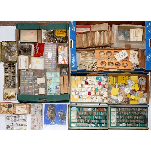 803 - Miscellaneous watchmaker's parts, including bracelets, cogs, crystals, hands, retail display stands,... 