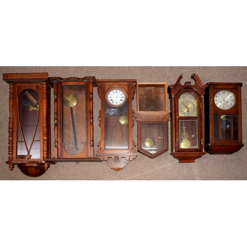 806 - Six various wall clocks or clockcases, early 20th c and later, 82cm h and smaller