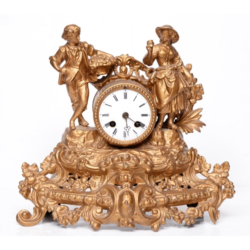 842 - A French giltmetal figural mantle clock, 19th c, with enamel dial, pendulum and key, 31cm h... 